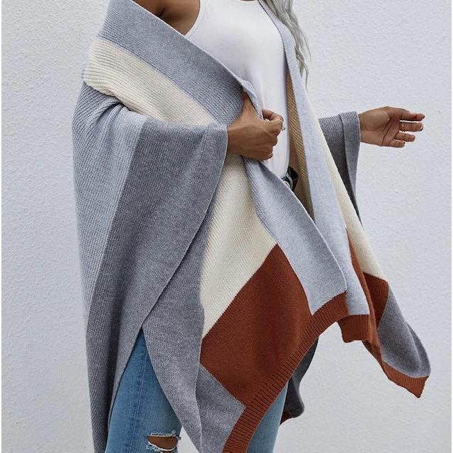 Block Throw Over

The perfect throw over for any season &amp; any outfit

wool mix in a beautiful colour combo of grey, powder blue, ivory &amp; chocolate