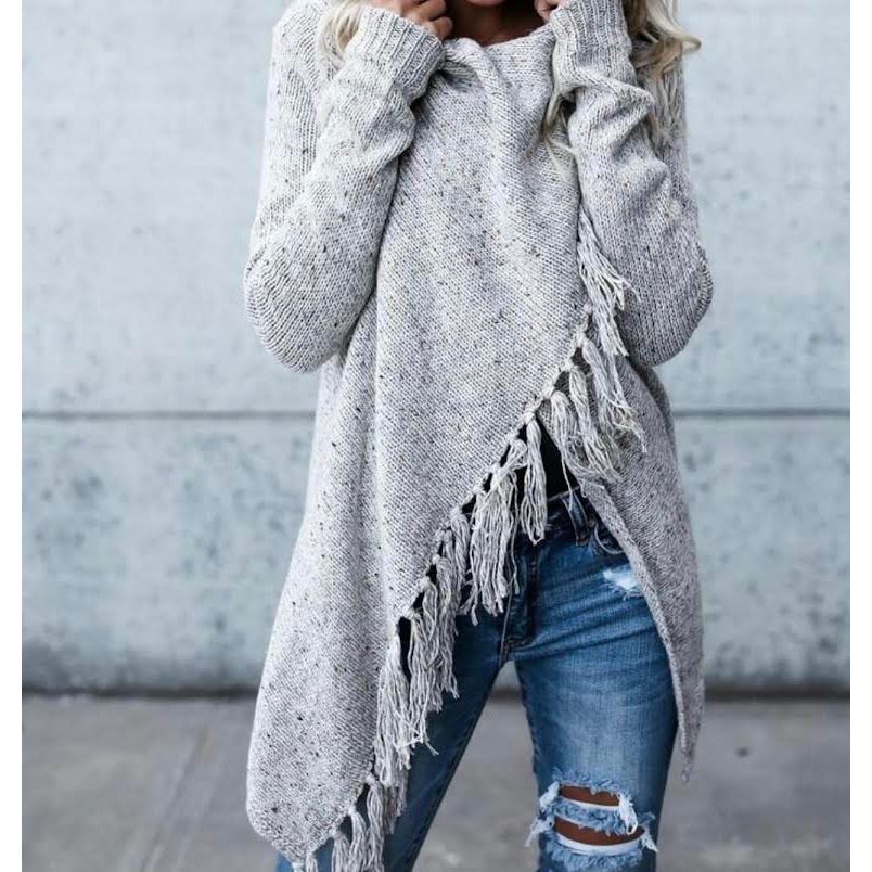 Fringe draped cardi, button on each shoulder to hold the draping

A style with an edge