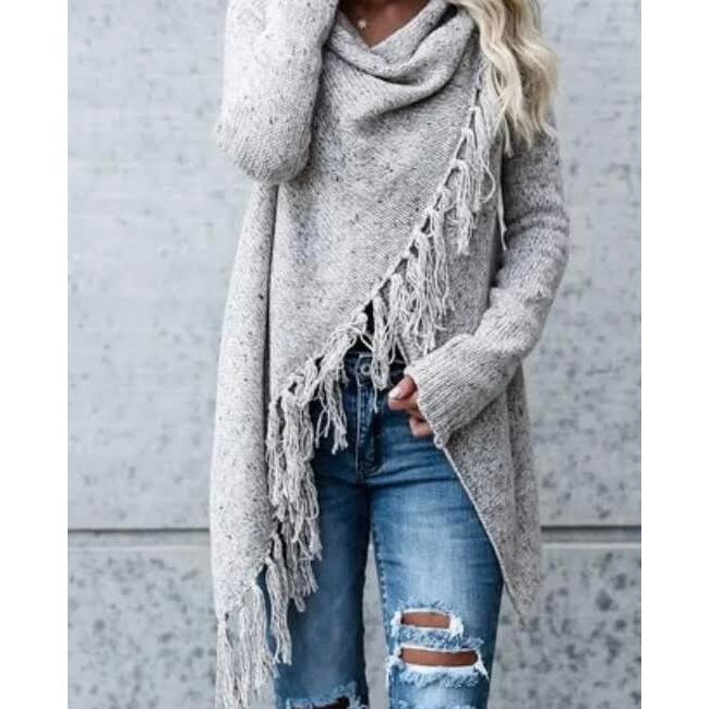 Fringe draped cardi, button on each shoulder to hold the draping

A style with an edge