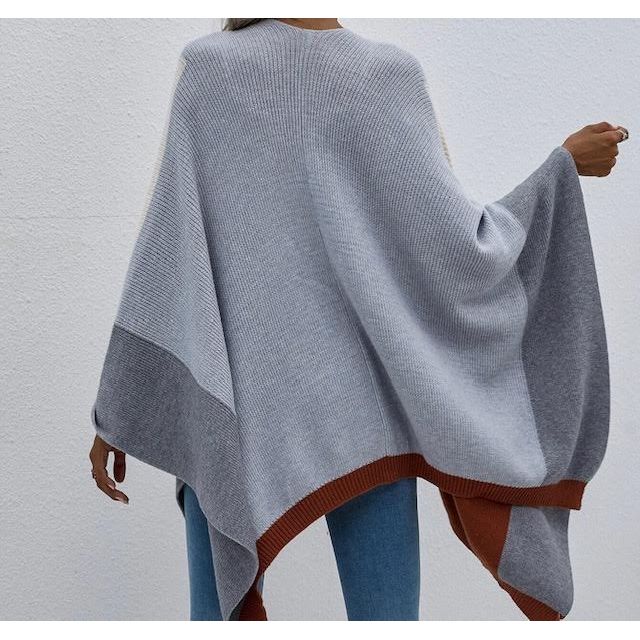 Block Throw Over

The perfect throw over for any season &amp; any outfit

wool mix in a beautiful colour combo of grey, powder blue, ivory &amp; chocolate