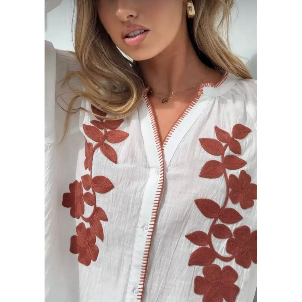 Thea Embroidered Cotton Blouse

Stunning 100% soft cotton blouse with delightful embroidered floral motifs in rich caramel.