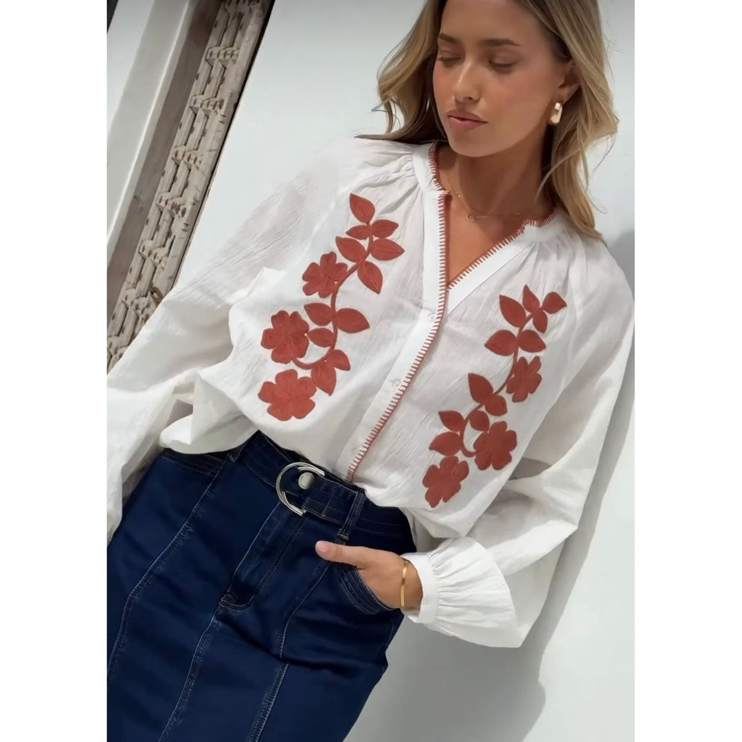 Thea Embroidered Cotton Blouse

Stunning 100% soft cotton blouse with delightful embroidered floral motifs in rich caramel.