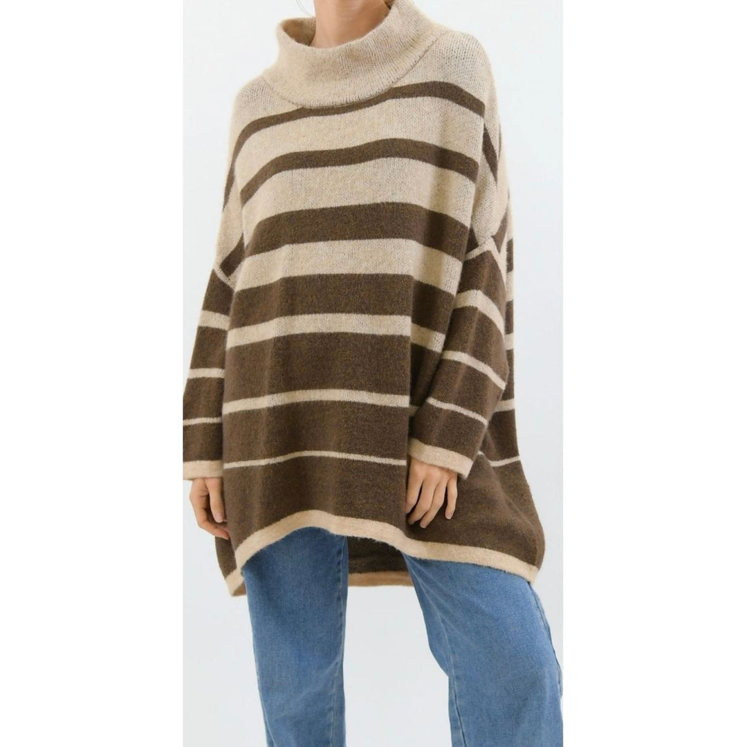 Amara Cashmere Oversized Jumper

High neckline

Hi Lo hemline

Relaxed fit

5% wool 30% cashmere 30% polyester 45% acrylic