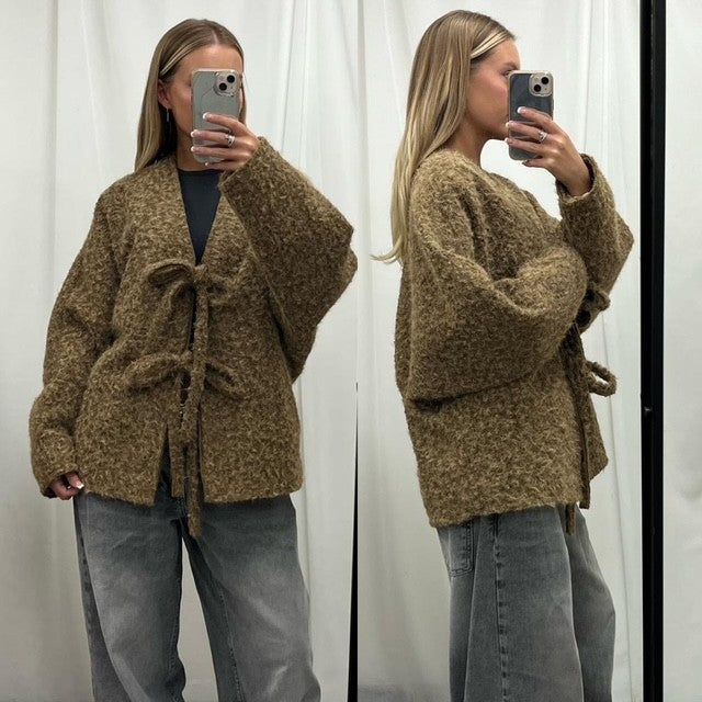 Olive Jacket

Gorgeous textured olive jacklet with tie front &amp; beautifully lined for warmth