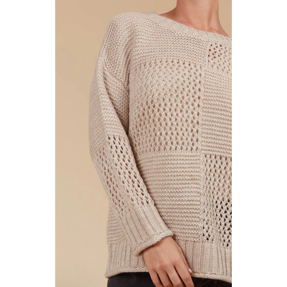 Luna Jumper - Canvas

The Luna Jumper is your new excuse to live in knitwear. This classic knit gets a modern twist with a unique contrasting weave pattern in a perfect-for-the-season colour palette. Its relaxed fit makes it a layering pro—whether you're throwing it over a light tee or under a heavier coat. Crafted in a cosy wool blend, this knit is made for cooler days. Pair it with your go-to jeans, a snug scarf, and comfy loafers for a laid-back seasonal vibe.