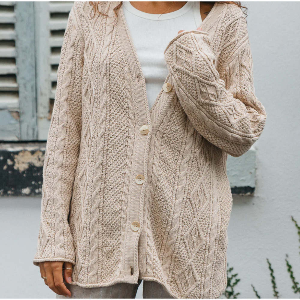 Cohen Unisex Cable Knit Cardigan

Style borrowed from nostalgia... the Cohen Cardigan provides a laid back look with a snug feel. Crafted from the softness linen and cotton with a cable knit finish, it has a draped fit designed to be worn open over your favourite outfit or buttoned up for extra warmth.