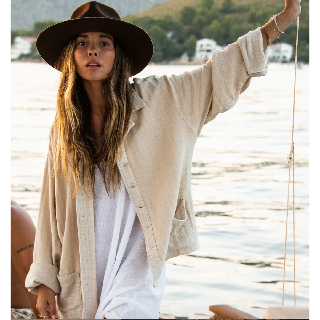 Soller - Oat Shirt/Jacket

Pronounced Soy-er and named after a once very isolated, yet widely known beautiful harbour town on the Spanish island of Mallorca. The history of Port de Sóller was one of resilience, isolation and rich seafaring/trade. The Soller shirt has many similarities. Made from a premium and unique Ramie fabric, it is a versatile long sleeve, in an oatmeal colour way designed to wade off sun and built to stand strong on its own.