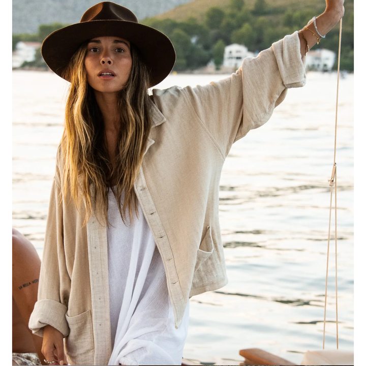 Soller - Oat Shirt/Jacket

Pronounced Soy-er and named after a once very isolated, yet widely known beautiful harbour town on the Spanish island of Mallorca. The history of Port de Sóller was one of resilience, isolation and rich seafaring/trade. The Soller shirt has many similarities. Made from a premium and unique Ramie fabric, it is a versatile long sleeve, in an oatmeal colour way designed to wade off sun and built to stand strong on its own.
