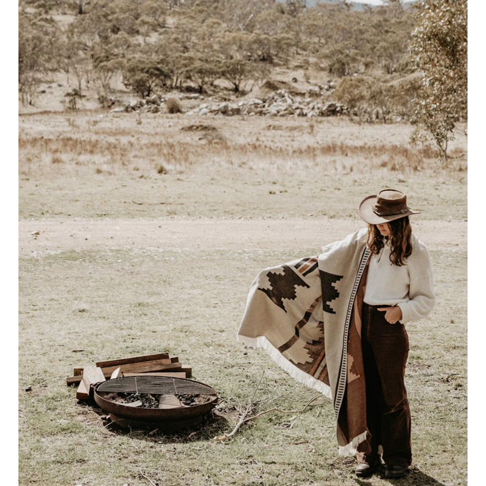 Up River Wrap150x 220cm



Because a good sarong never goes amiss in the summertime! Lightweight, breathable and versatile, the Up River Wrap in Natural is your new favourite companion for warm days and breezy nights. With its subtle, earthy pattern inspired by rugged landscapes, this wrap blends natural tones with a grounded, geometric design that feels like the steady lines of a mountain ridge. Style it up as a wrap, twist it into a top, or drape it as a shawl for a bit of sun protection.