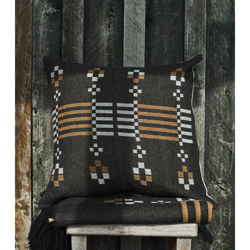 Alpine Retreat Cushion Black/ Neutral 55x55cm

The cushion that’s as versatile as your weekend plans. One side gives you a fresh, laid-back vibe, like a morning in the mountains. Flip it and you’ve got bold, moody energy, like a storm rolling in over the peaks.

Made from tough cotton jacquard, it’s built to last, adding some serious texture and warmth to whatever space you throw it in. Whether it’s on the couch after a long day or packed for a weekend away, this cushion’s ready to roll. Soft to sink into, 