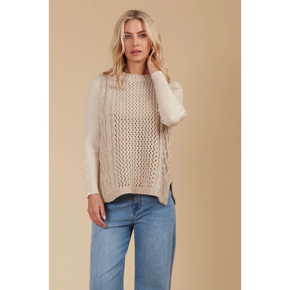 Luna Knit Vest

\Cosy meets chic in the form of the Luna Knit Vest, your go-to piece for changing seasons. The distinctive weave of this vest adds a lovely texture to your outfit while providing an extra layer of warmth. Pair it with a simple t-shirt, a skivvy, or a button-down shirt, along with leggings or jeans, for a sleek and easygoing look.