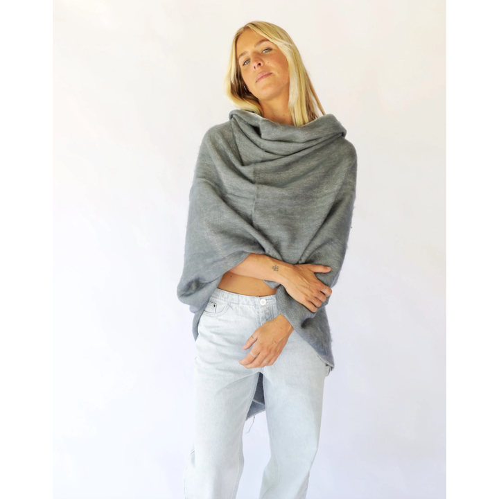 Our Ponchos are a go-to for the moments when you need that extra warmth without sacrificing practicality. Whether you’re&nbsp;on the go, or simply enjoying a cuppa and a good read this piece will always be there for you.

Pair this piece with your favourite denim and sneakers for a casual ever