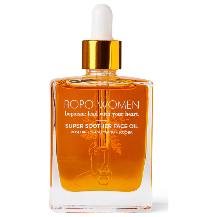 Super Soother is a completely natural face oil created to rehydrate and restore tired and dehydrated skin in need of some loving. Its beautiful orange glow is derived from rosehip, an oil rich in essential fatty acids that hydrates skin while promoting skin cell regeneration. Sweet almond oil and jojoba deeply quench, while lavender detoxifies and ylang ylang balances. Best for dry or combination skin types. Absorbs really quickly and is amazing under make-up