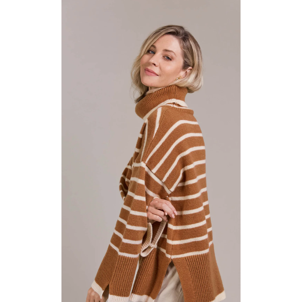 Katana Roll Neck Knit

The Katana Roll Neck Knit strikes a balance between timeless and modern, made from sustainably sourced 100% recycled polyester. Its oversized fit and roll neck make it ideal for layering during the colder months. Horizontal stripes lend visual appeal, complemented by vents on the sleeves and hem. Style it effortlessly with linen pants or jeans and comfortable flats for laid-back days.

