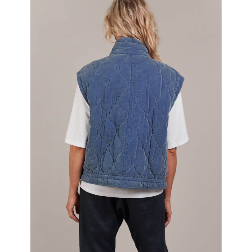 Pepi Vest

Designed with purpose, the Pepi Vest is crafted from 100% cotton and features a practical zip and press stud closure, convenient patch pockets, and an adjustable drawstring for the perfect fit. Quilted detailing adds a soft, textured touch, giving this puffer a unique look. A new essential you didn't know you needed, it layers effortlessly over activewear or loungewear for the ideal throw-on style.