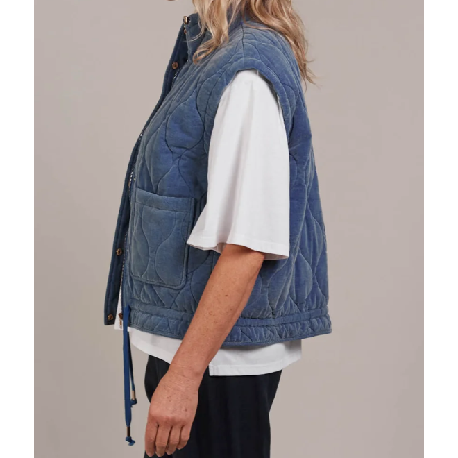 Pepi Vest

Designed with purpose, the Pepi Vest is crafted from 100% cotton and features a practical zip and press stud closure, convenient patch pockets, and an adjustable drawstring for the perfect fit. Quilted detailing adds a soft, textured touch, giving this puffer a unique look. A new essential you didn't know you needed, it layers effortlessly over activewear or loungewear for the ideal throw-on style.
