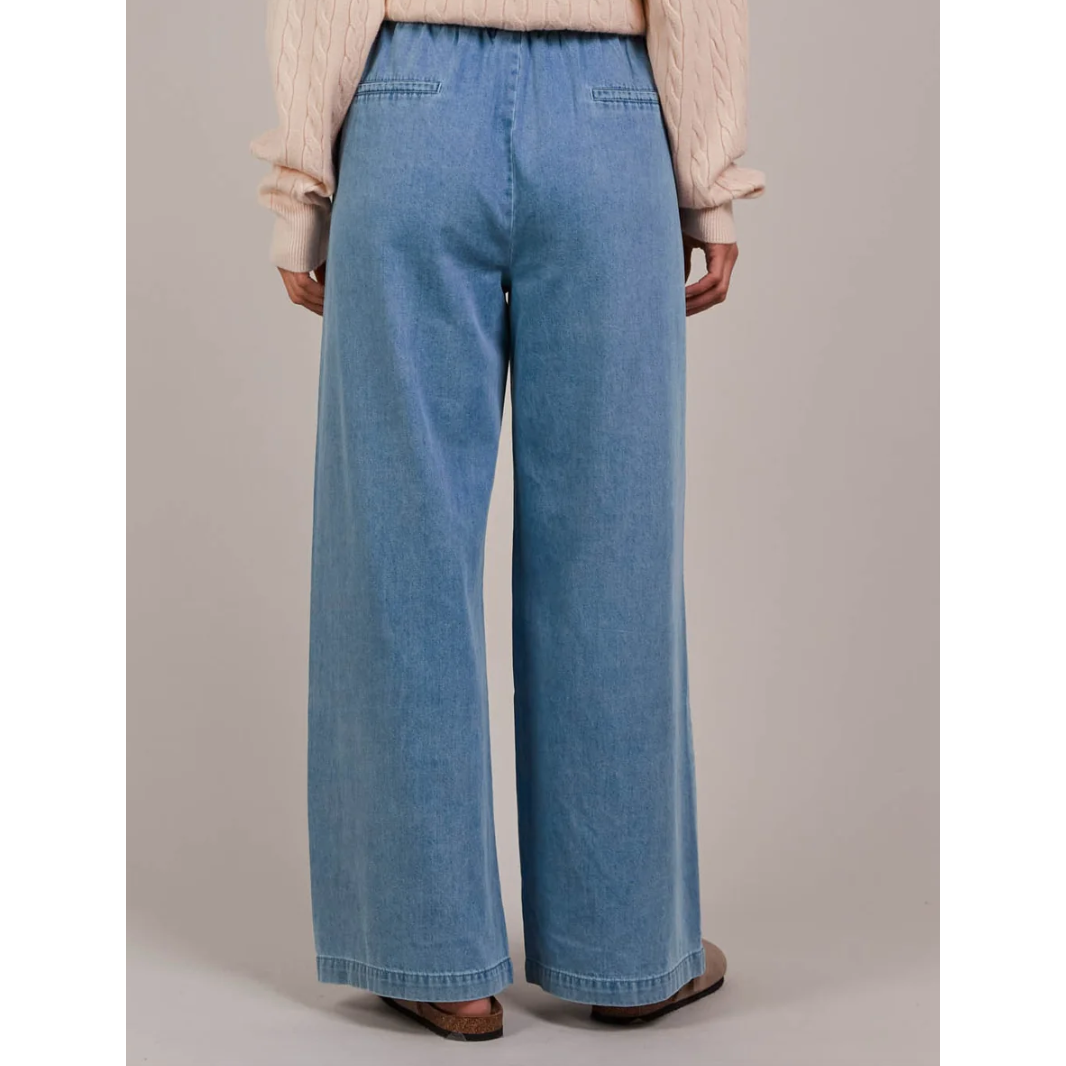Pepi Wide Denim Pants

The Pepi Wide Denim Pant brings a fresh, modern feel to a timeless style with its wide-leg silhouette. Thoughtfully designed with inseam pockets for added practicality, it features an elastic waistband and an adjustable drawstring for a custom fit. Made from ultra-soft cotton denim, these pants are comfortable and versatile enough for any season. Wear them with a cosy knit and ballet flats for a laid-back, stylish look.