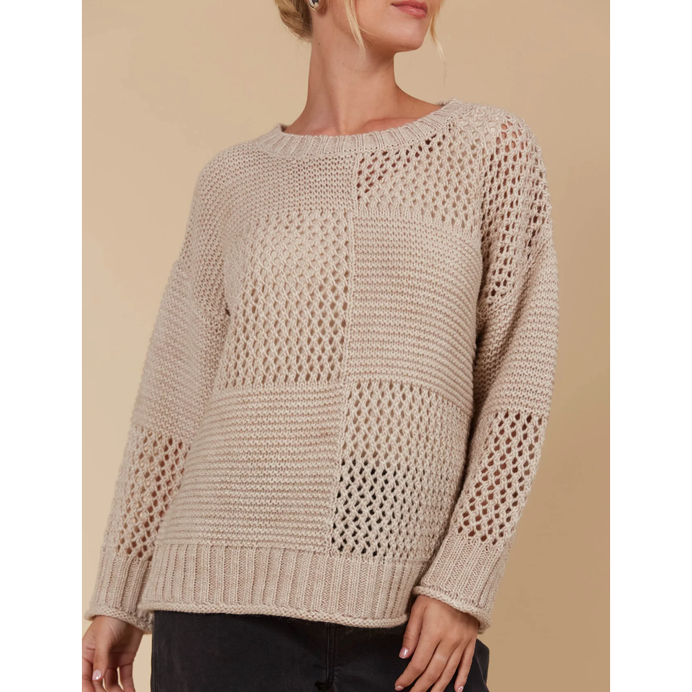Luna Jumper - Canvas

The Luna Jumper is your new excuse to live in knitwear. This classic knit gets a modern twist with a unique contrasting weave pattern in a perfect-for-the-season colour palette. Its relaxed fit makes it a layering pro—whether you're throwing it over a light tee or under a heavier coat. Crafted in a cosy wool blend, this knit is made for cooler days. Pair it with your go-to jeans, a snug scarf, and comfy loafers for a laid-back seasonal vibe.