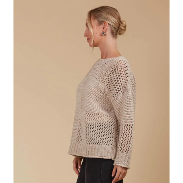 Luna Jumper - Canvas

The Luna Jumper is your new excuse to live in knitwear. This classic knit gets a modern twist with a unique contrasting weave pattern in a perfect-for-the-season colour palette. Its relaxed fit makes it a layering pro—whether you're throwing it over a light tee or under a heavier coat. Crafted in a cosy wool blend, this knit is made for cooler days. Pair it with your go-to jeans, a snug scarf, and comfy loafers for a laid-back seasonal vibe.
