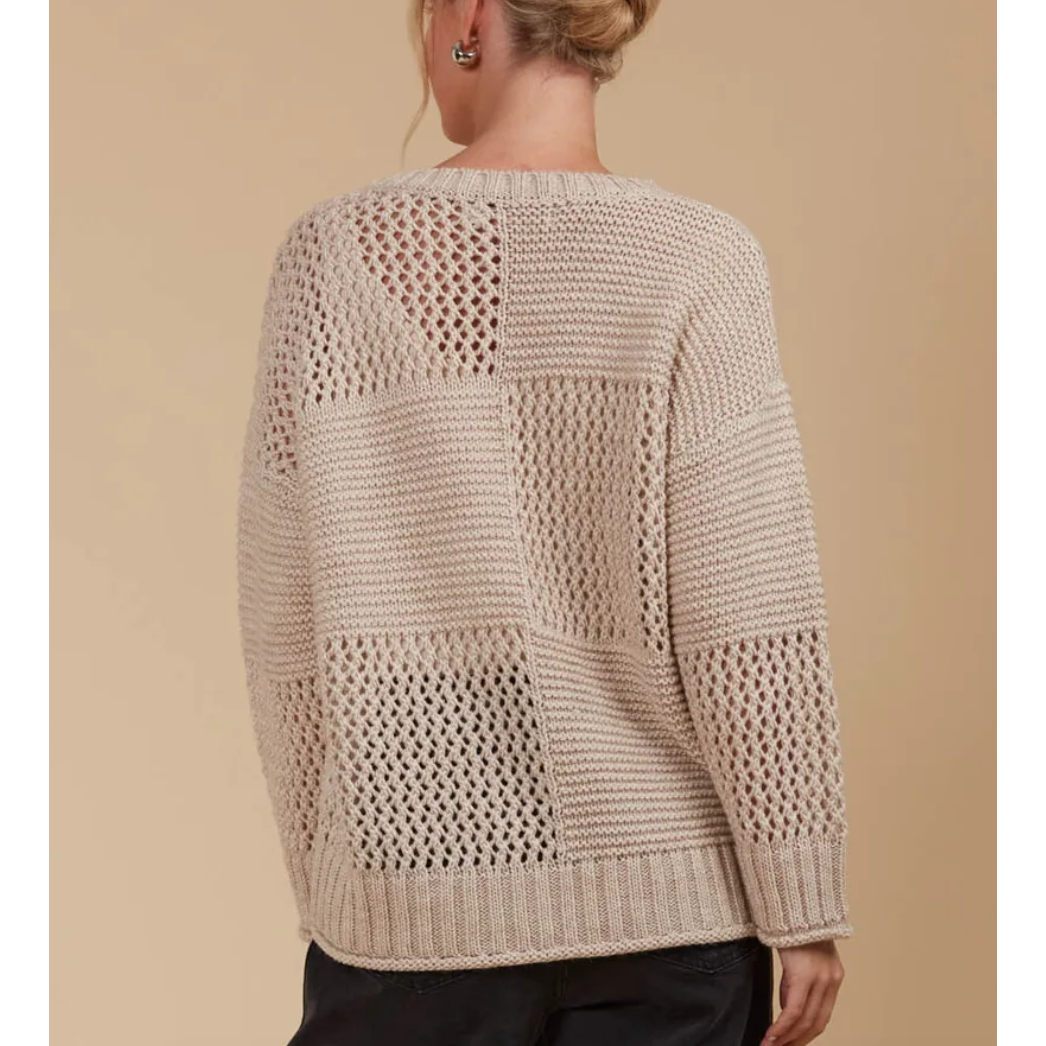 Luna Jumper - Canvas

The Luna Jumper is your new excuse to live in knitwear. This classic knit gets a modern twist with a unique contrasting weave pattern in a perfect-for-the-season colour palette. Its relaxed fit makes it a layering pro—whether you're throwing it over a light tee or under a heavier coat. Crafted in a cosy wool blend, this knit is made for cooler days. Pair it with your go-to jeans, a snug scarf, and comfy loafers for a laid-back seasonal vibe.