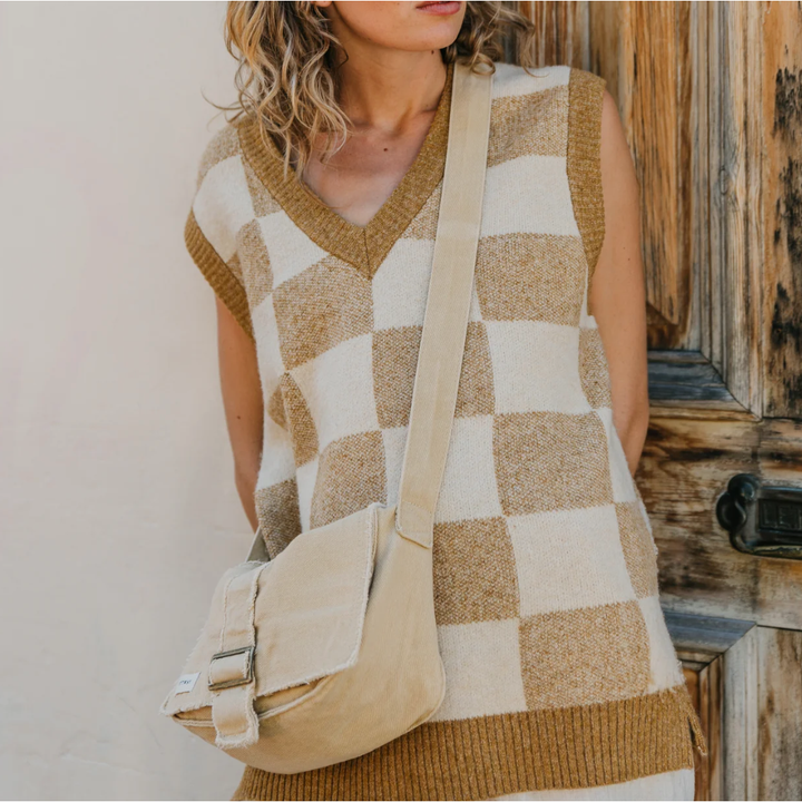 Archie - Brown Checkered Vest

A timeless staple, reimagined. The Archie Brown Checkered Vest is an ode to the classic vest shape that has stood the test of time. Made from 100% cotton, it’s designed with an oversized fit, perfect for layering over a shirt, tee, dress, or even wearing on its own! The brown and cream checkered fabric adds a unique touch, making it a go-to piece season after season.