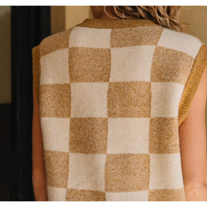 Archie - Brown Checkered Vest

A timeless staple, reimagined. The Archie Brown Checkered Vest is an ode to the classic vest shape that has stood the test of time. Made from 100% cotton, it’s designed with an oversized fit, perfect for layering over a shirt, tee, dress, or even wearing on its own! The brown and cream checkered fabric adds a unique touch, making it a go-to piece season after season.