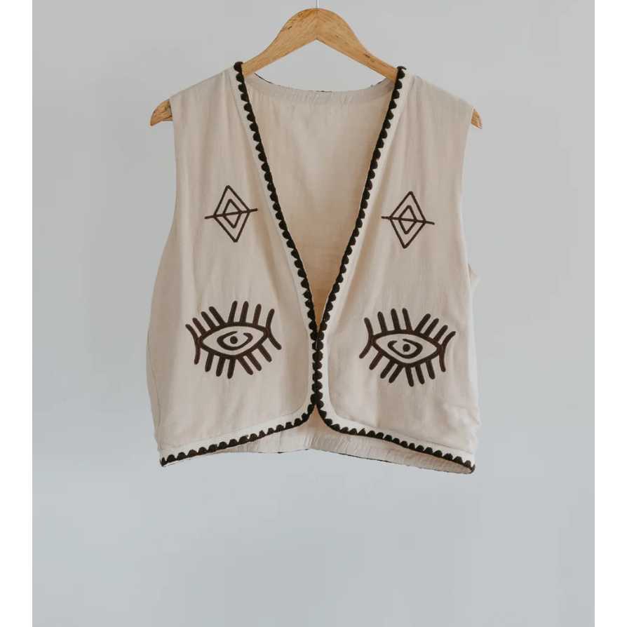 Boho Vest - Hazel

Introducing our Hazel Vest - with carefully thought out brown embroidery that adds depth and character. Crafted from lightweight cotton, it ensures a more flowy, laidback fit compared to your standard structured vest.Embrace the versatility by layering it over a shirt/dress showing your personal style!