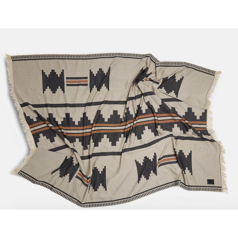 Up River Wrap150x 220cm



Because a good sarong never goes amiss in the summertime! Lightweight, breathable and versatile, the Up River Wrap in Natural is your new favourite companion for warm days and breezy nights. With its subtle, earthy pattern inspired by rugged landscapes, this wrap blends natural tones with a grounded, geometric design that feels like the steady lines of a mountain ridge. Style it up as a wrap, twist it into a top, or drape it as a shawl for a bit of sun protection.