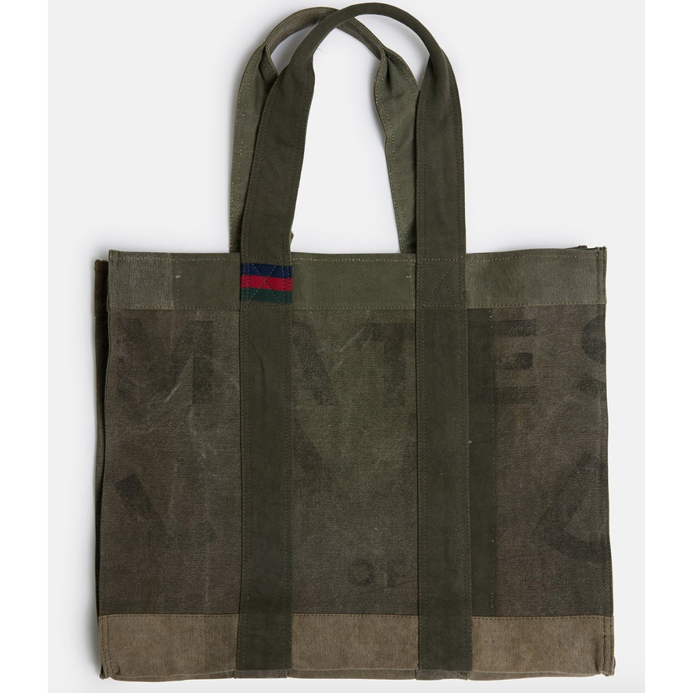 Land of Mates Tote-Kahki

50/40/14cm



The Land of Mates Tote combines eco-conscious design with rugged urban style. Made from upcycled truck canvas, each bag features unique, faded prints that give it a raw, industrial charm. The minimalist design and durable material make it the perfect tote for city dwellers who value individuality and sustainability. Whether you're commuting or running errands, the Land of Mates Tote is a statement piece that embodies both style and eco-conscious craftsmanship