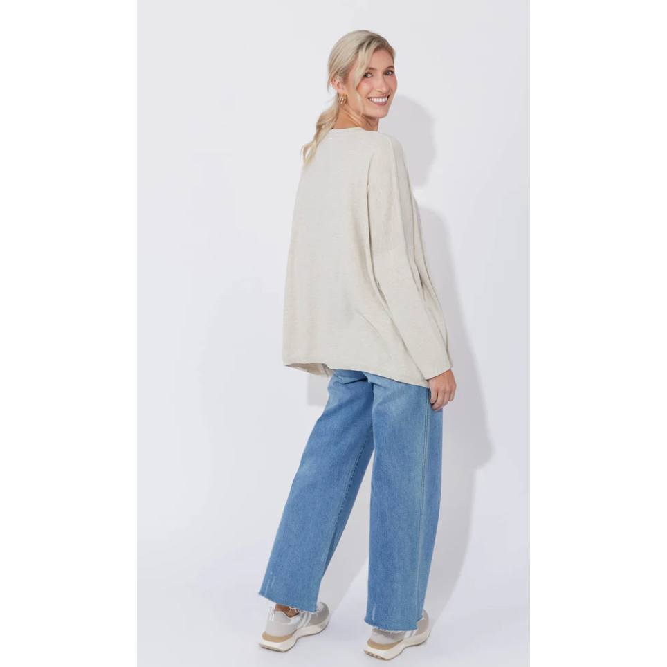 Haven Jumper - Sand. one size

The Haven Jumper is our idea of the ultimate relaxed-fit, modern knit. Designed with dropped shoulders, a round neckline, and a vibrant, electrifying colour palette, this knit offers the perfect way to brighten up your winter wardrobe. Crafted from ultra-soft cotton, this knit layers beautifully over simple T-shirts or classic button-downs. Pair it with a denim skirt or relaxed linen pants for an easy, stylish look.