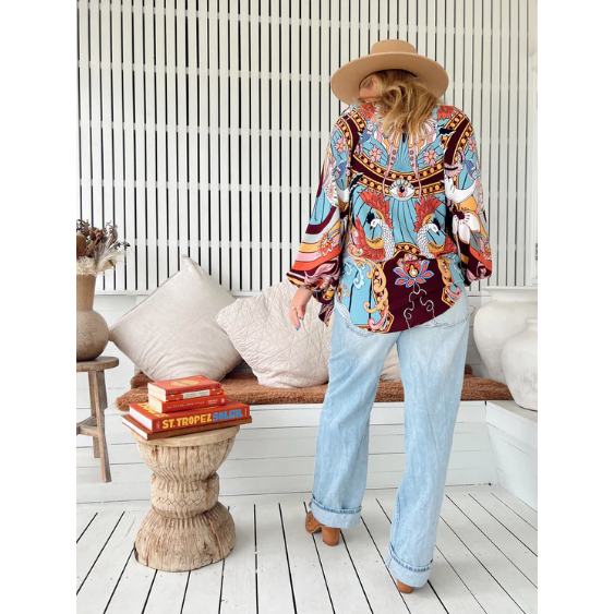 Wild Hearts Imogen Blouse

Detailed and delicate this blouse is the perfect way to dress up any outfit. The centre bust features buttons with tassel neckties. The sleeves are a long relaxed fit with loose gathered elastic cuff.